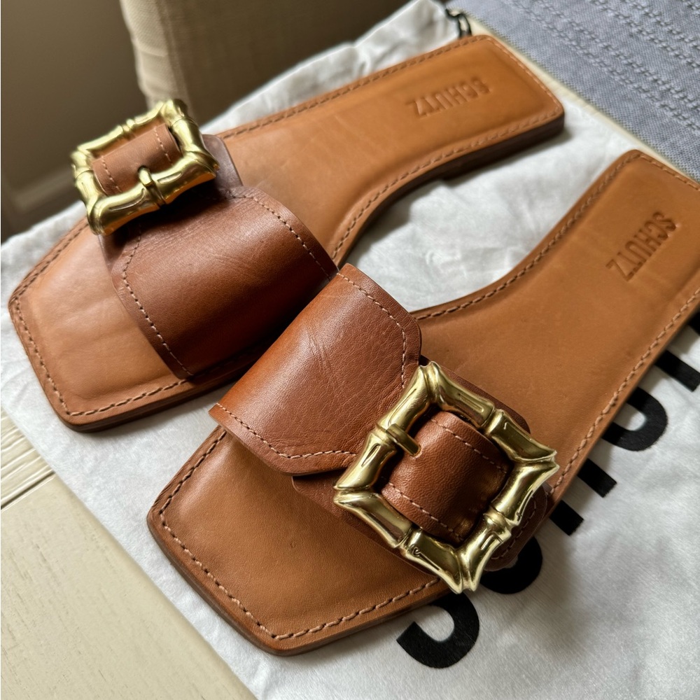 Schutz Wavy Leather Buckle Slide Sandals